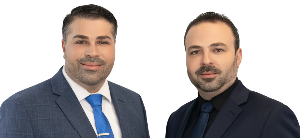 Headshot of Dr. Tarek Moqattash and Dr. Leonardo Moqattash smiling in suit and tie